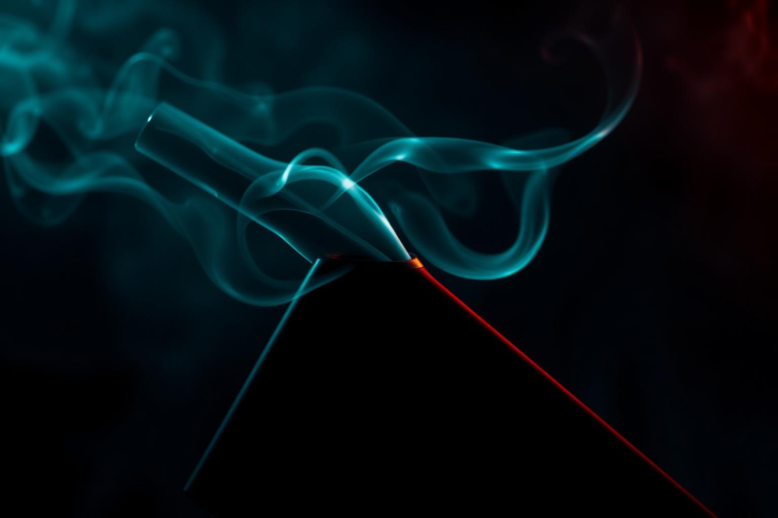Premium vape device with neon smoke